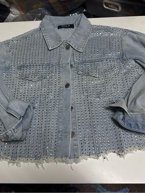 Studded Light Wash Denim Jacket with Distressed Hem